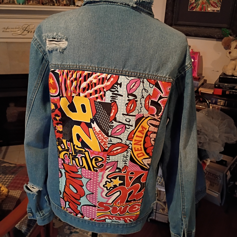 Blu[edit] 2026 Distressed Denim Jean Jacket ComicCon